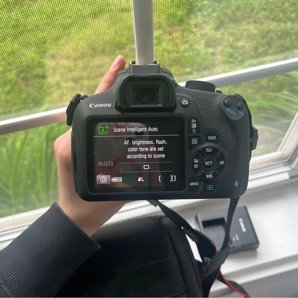 Canon T-5 Camera + Lense + Travel Bag. Had for a few years and never used!